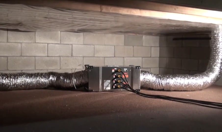 Phoenix Firebird Compact Heater with ducts set up in crawl space