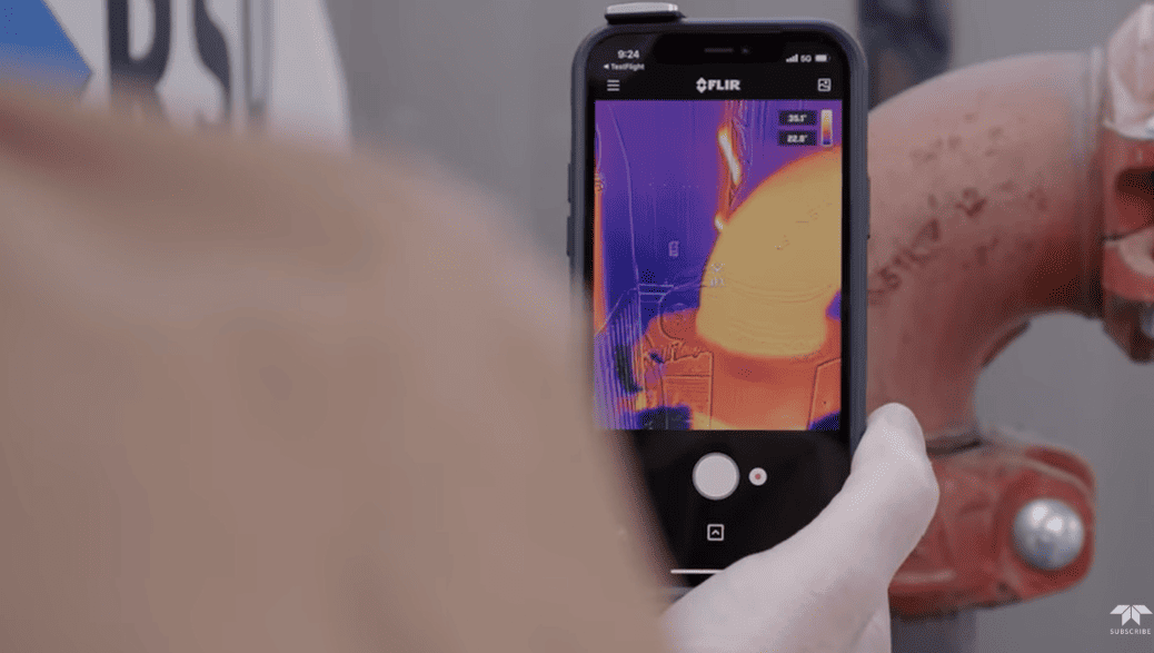 FLIR ONE Edge Pro thermal camera Thermographic imaging device held by a person with a blurred background