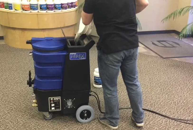 Person using a Ninja 500, cleaning machine