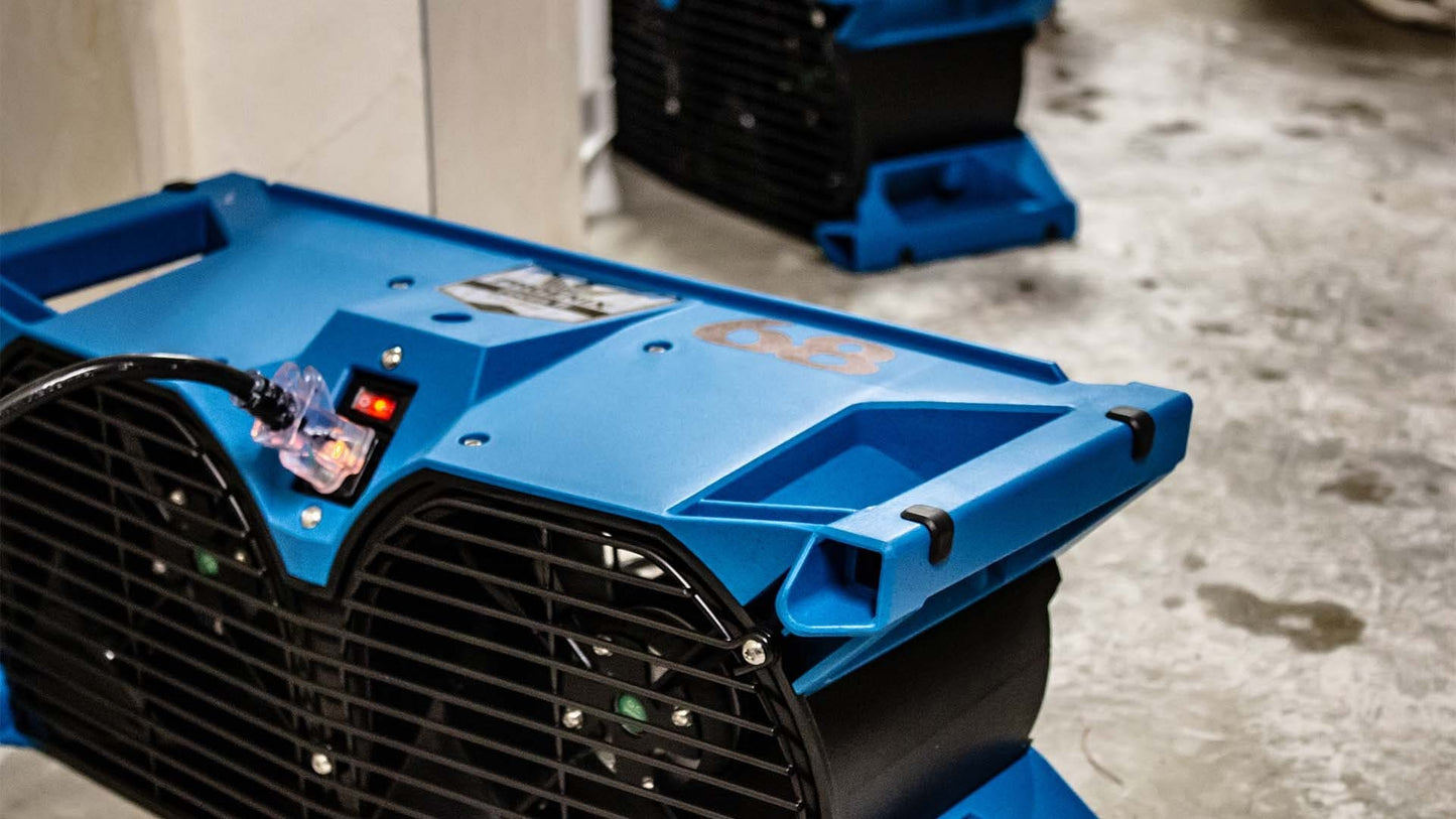 Blue Phoenix Focus II Dual Axial Air Mover on a concrete floor