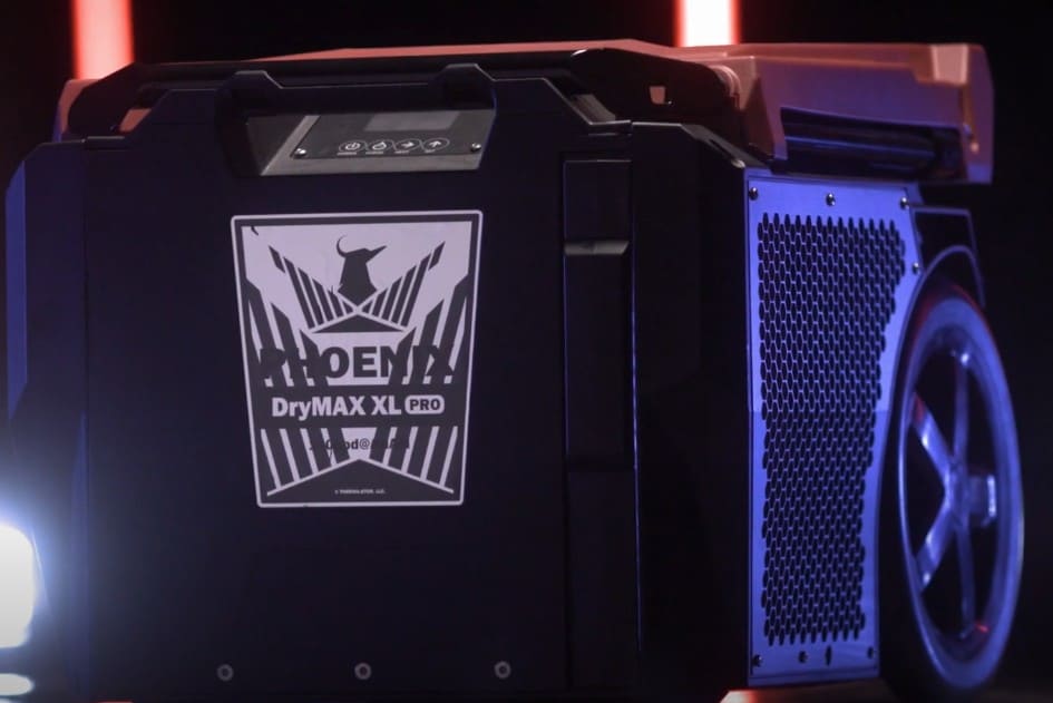 DryMAX XL Pro dehumidifier with visible branding on a dark background