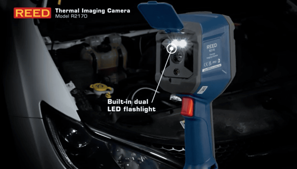REED R2170 thermal imaging camera with built-in dual LED flashlight on a car's engine compartment.