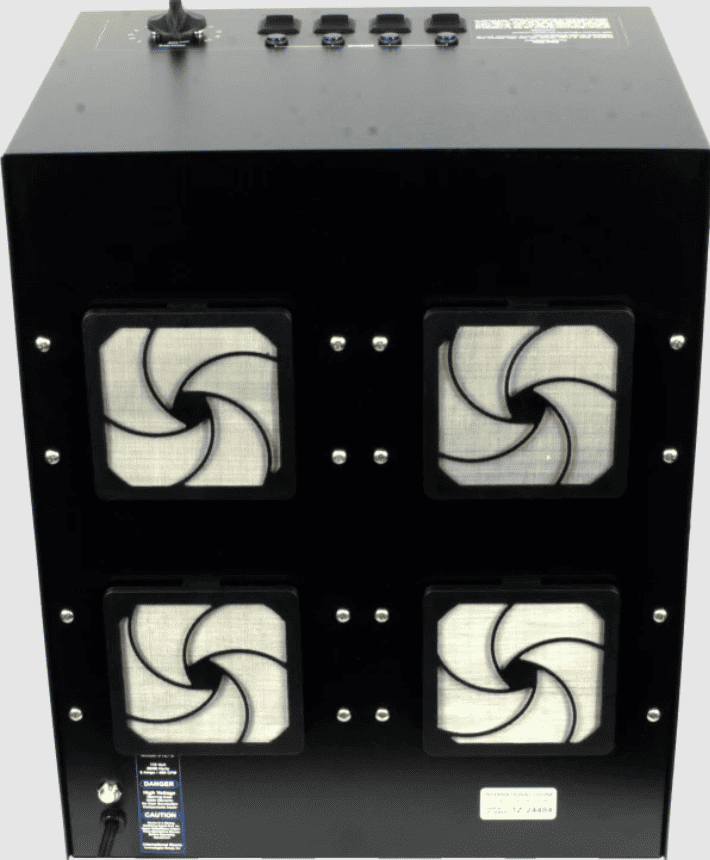 Black Total Zone TZ 8 ozone generator with four white filter elements on a white background