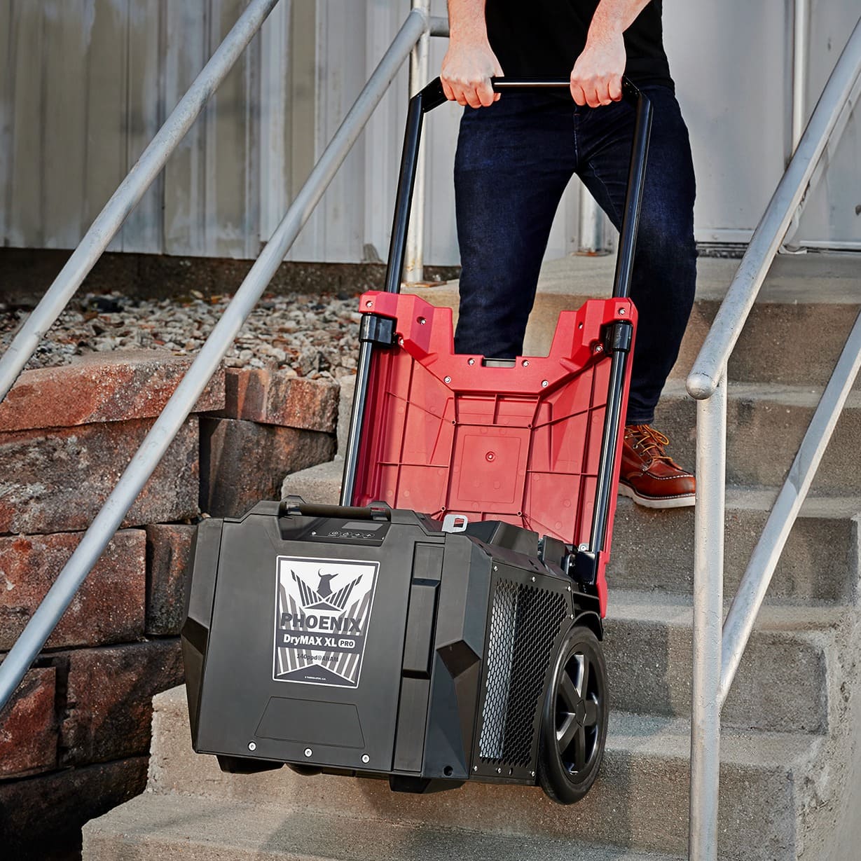 drymax xl pro being pulled up stairs