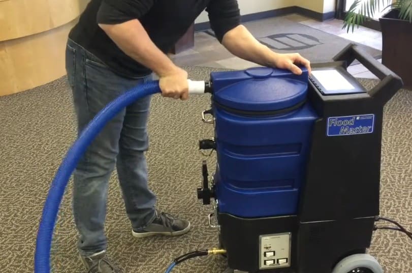 esteam water extractor Flood master on carpet background
