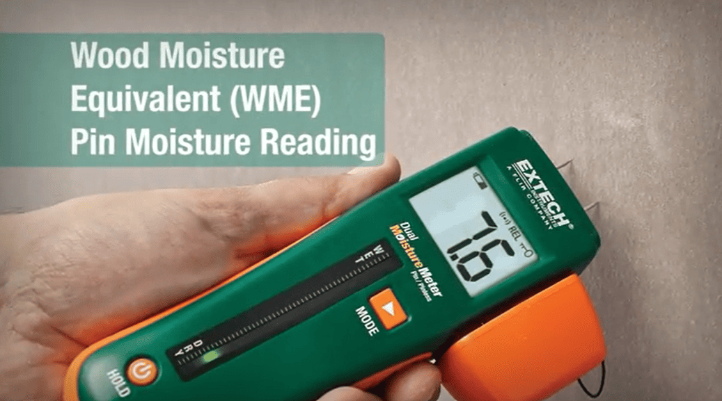 Extech mo260 digital moisture meter displaying a wood moisture equivalent reading on a neutral background