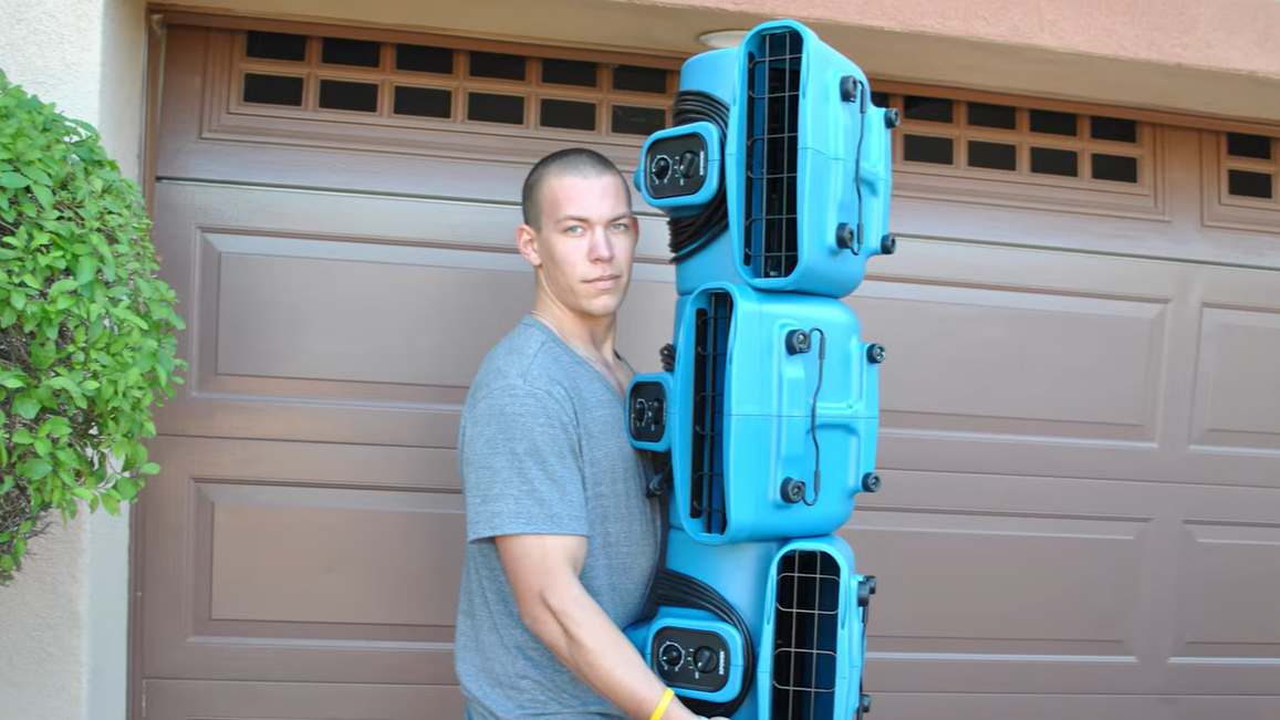 Xpower p630 on stack man carrying the air movers