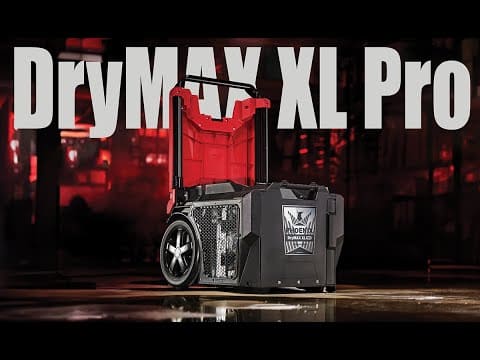 phoenix drymax dehumidifier with red top and black body on a dark background
