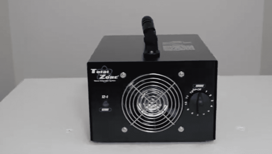 Black total zone tz 1 ozone generator front on a white surface