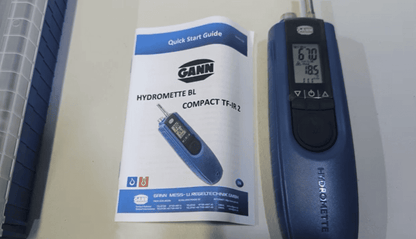 blue Gann Hydromette BL Compact TF-ir-2 moisture meter with quick start guide on a white background