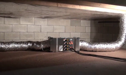 Phoenix Firebird Compact Heater with ducts set up in crawl space