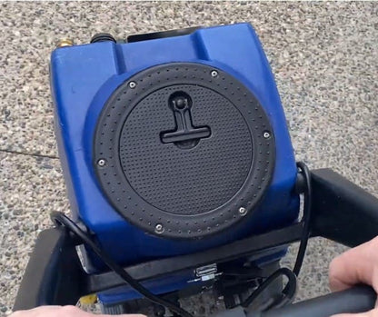 EsteamE600 with a black circular component on a gray pavement background