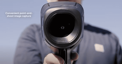 Person holding a flir e6 with a blurred background