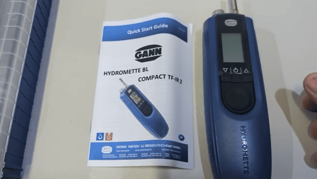 Gann Hydromette BL Compact TF-IR 2 soil moisture meter with quick start guide on a white background