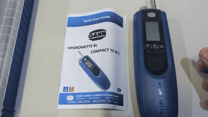 Gann Hydromette BL Compact TF-IR 2 soil moisture meter with quick start guide on a white background