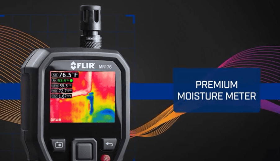 Flir MR176 moisture meter with thermal imaging display on a dark background