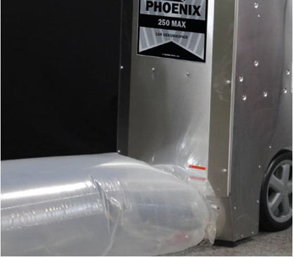 Metal dehumidifier with 'Phoenix 250 Max' label on a black background. ducting bag connected