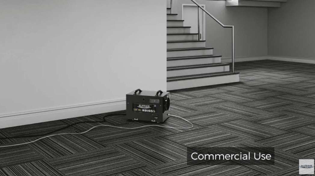 A Sentinel HDi65S Dehumidifier on a wooden floor, labeled 'Commercial Use'.