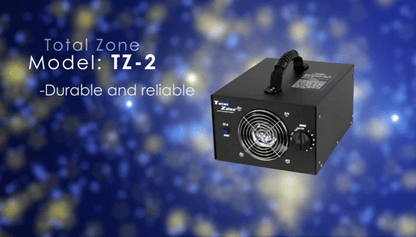 Black device labeled 'Total Zone Model: TZ-2' on a blue background with bokeh effect