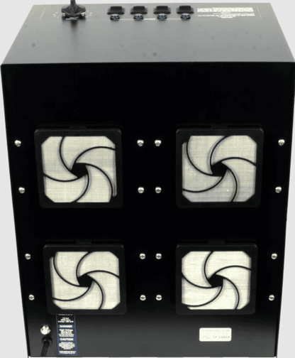 Black Total Zone TZ 8 ozone generator  with four white filter elements on a white background