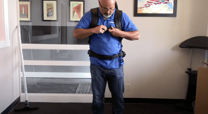 Using and strapping on atlas backpack