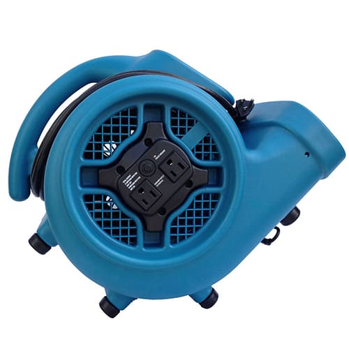 Blue industrial fan on an angle on a white bg