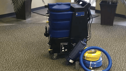 Commercial  esteam e1200 cleaning machine with hose on a carpeted floor