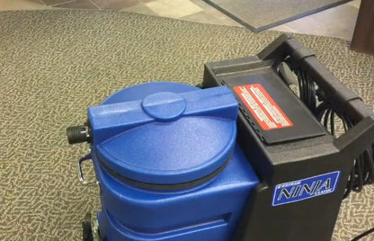 esteam ninja 500 psi Blue and black machine on a textured carpet