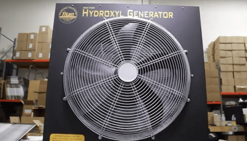 Titan 4000 Hydroxyl generator with a fan in a warehouse setting