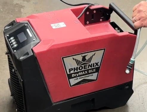 phoenix drymax ble lgr dehumidifier on a concrete floor.