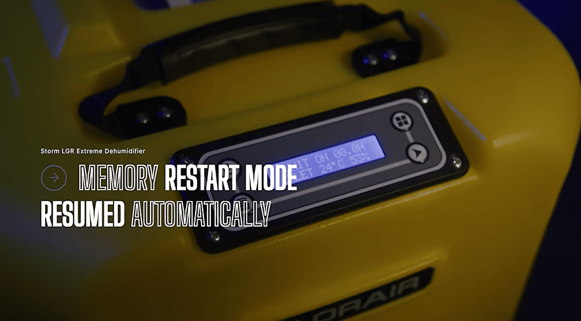 Digital display on a yellow storm lgr extreme dehumidifier with text about memory and restart mode.