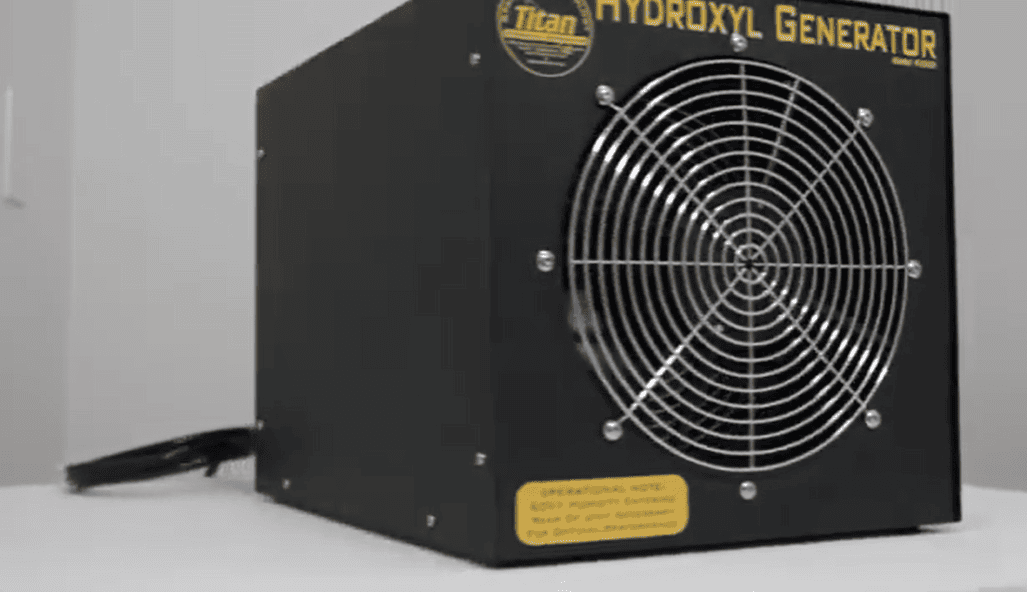 Black Titan 2000 hydroxyl generator with fan grille on a gray background
