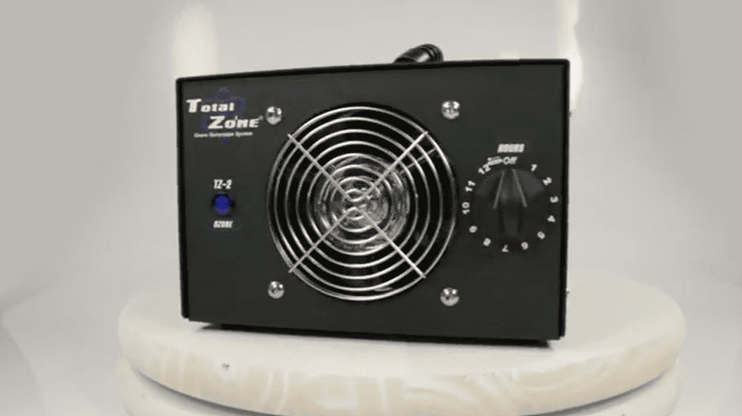 Black total zone tz 2 ozone generator with fan grille on a white background