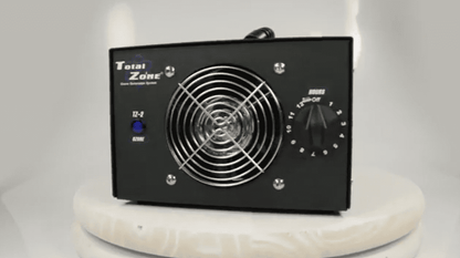 Black total zone tz 2 ozone generator with fan grille on a white background