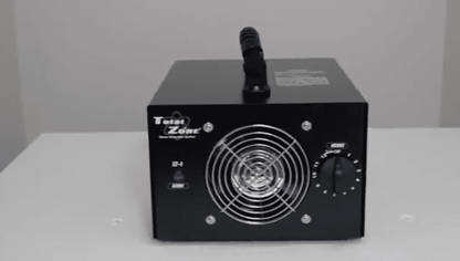 Black total zone tz 1 ozone generator front on a white surface
